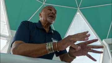 tour guide shares history of Biosphere 2